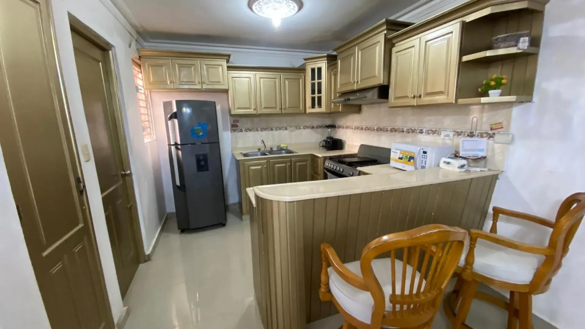 Dominican Comfort: Inverter-Equipped Apartment in Commercial Area La Estrella